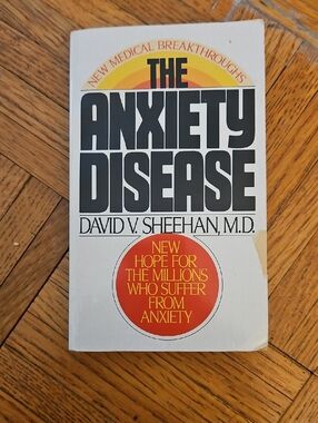 The Anxiety Disease by David V. Sheehan, M.D. — White Cover with Orange Accent